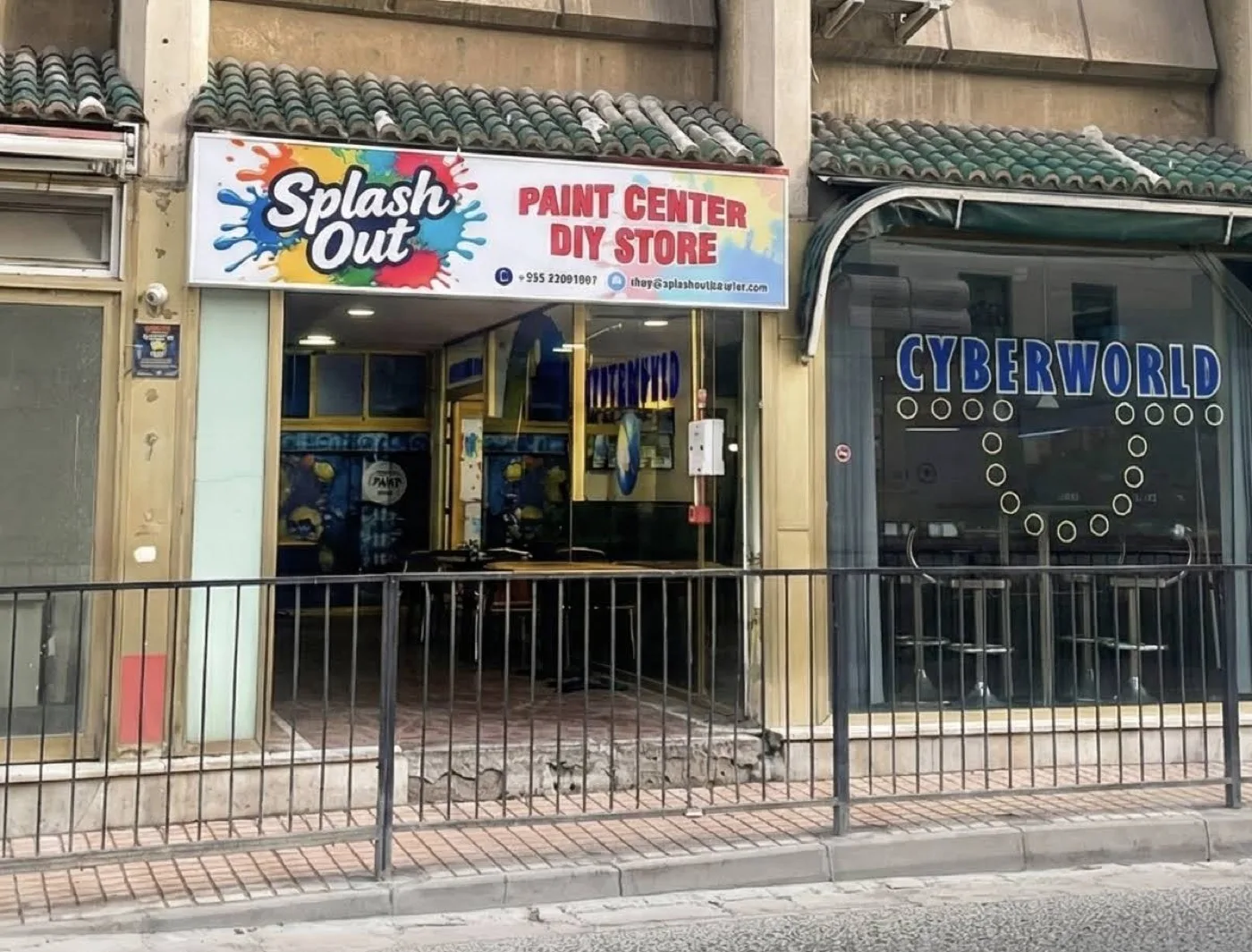 The Splash Out fascia sign reading Paint Center DIY Store above the shop entrance in Ocean Heights Arcade.